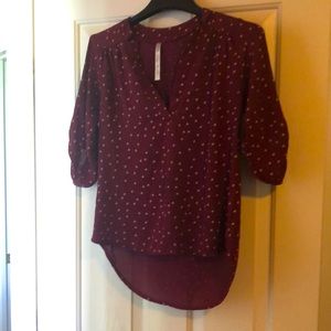 Size small burgundy/wine colored blouse